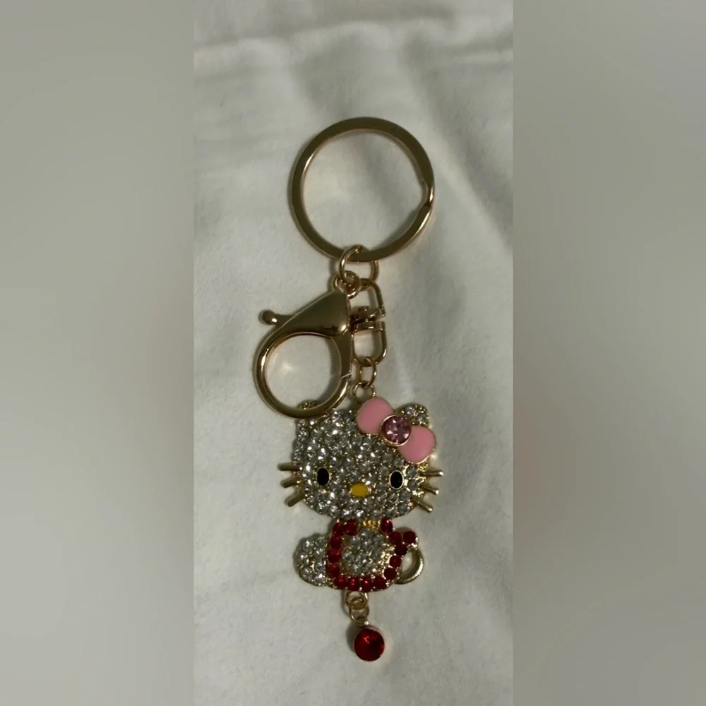 Bag-charm/Keyring Kitty with Pink Bow red and purple accents in gold tone! ❤️
